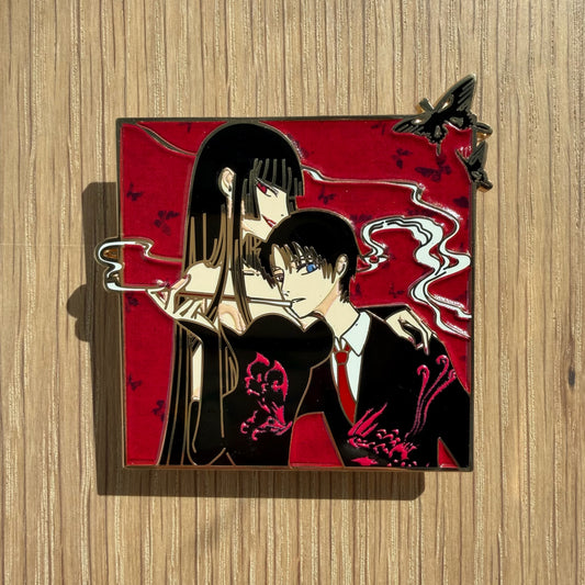 close-up xxxHolic-inspired enamel pin metal details
